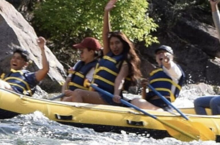 crew enjoying rafting